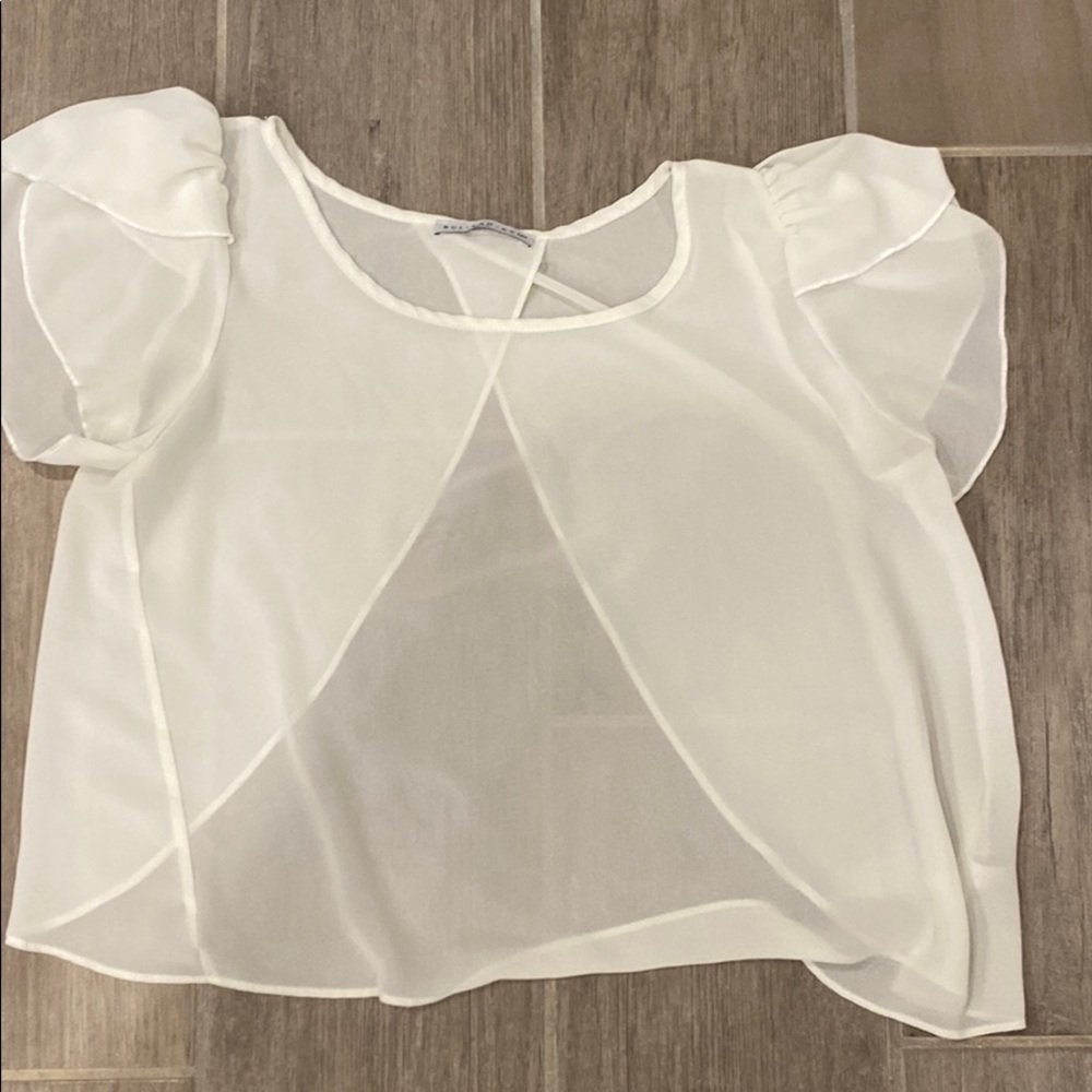 Cute white top; cutout on the back.